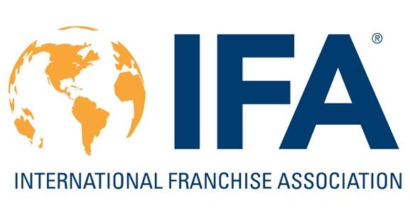 The logo shows an orange globe and the blue letters "IFA" next to the text "International Franchise Association.