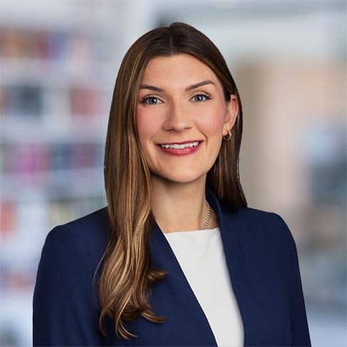 Skilled attorney at Foley & Lardner LLP professional office setting for legal services.